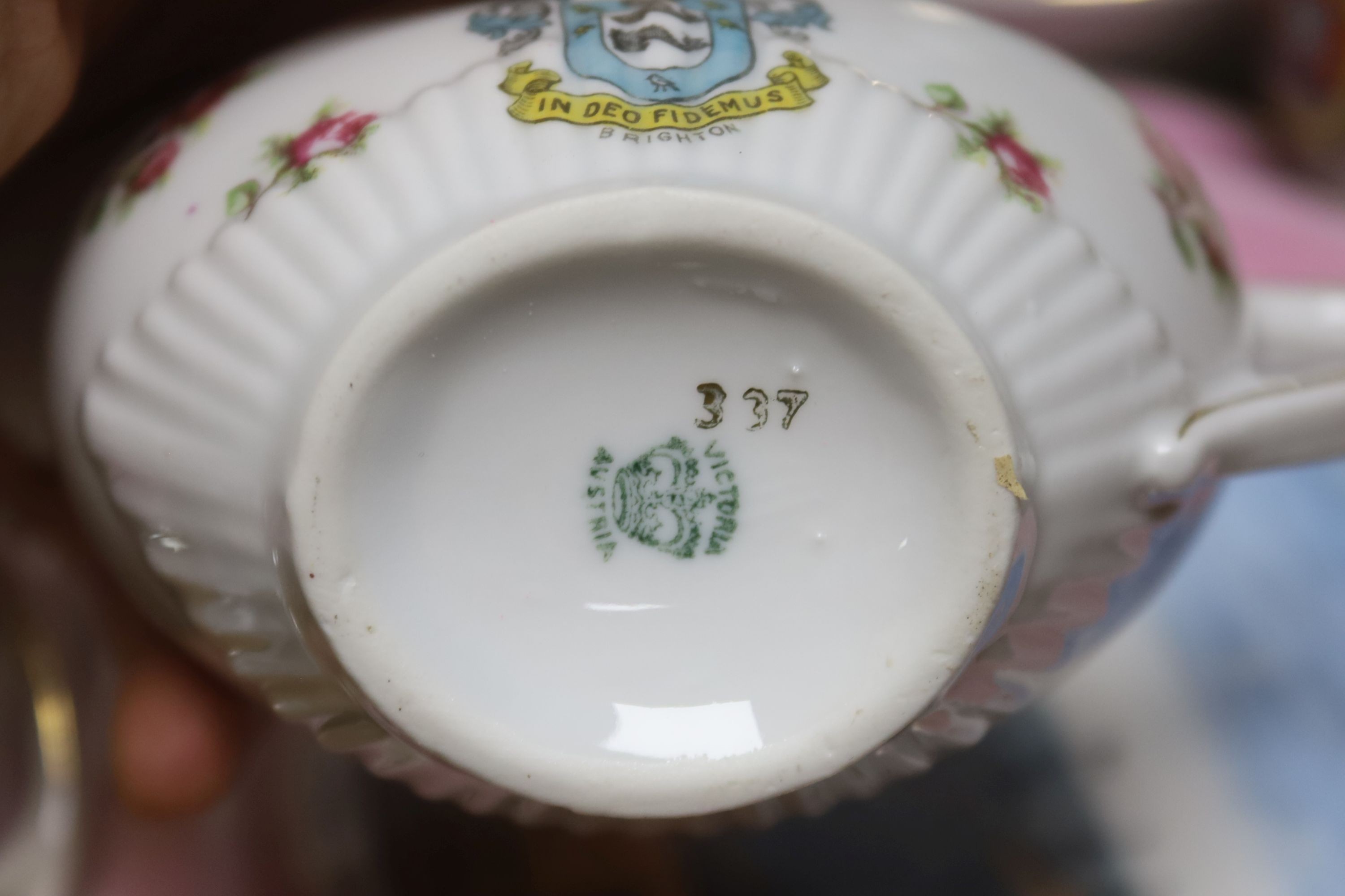 A group of late 19th century Brighton and London souvenir porcelain wares including crested wares